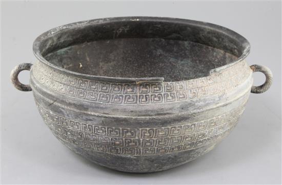 A Chinese archaic bronze flat-bottomed vessel, Eastern Zhou dynasty, 5th-4th century B.C., 31cm wide, losses